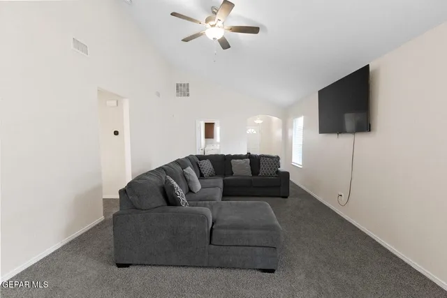 a kitchen with stainless steel appliances granite countertop a sink a stove and a microwave