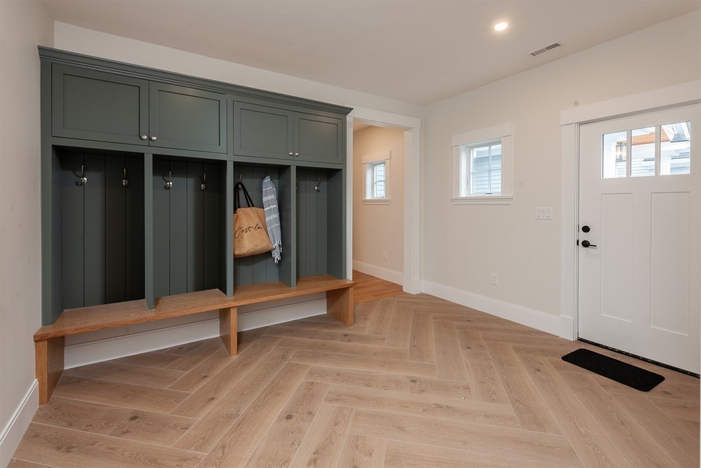 40 Rocky Hill Road Andover, MA 01810 - Photo 15 of 41 a view of an empty room with wooden floor and a window