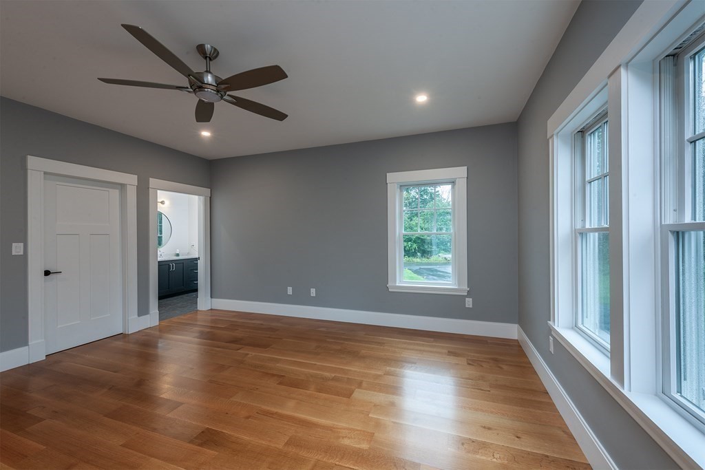 40 Rocky Hill Road Andover, MA 01810 - Photo 27 of 41 a view of a livingroom with a ceiling fan and window
