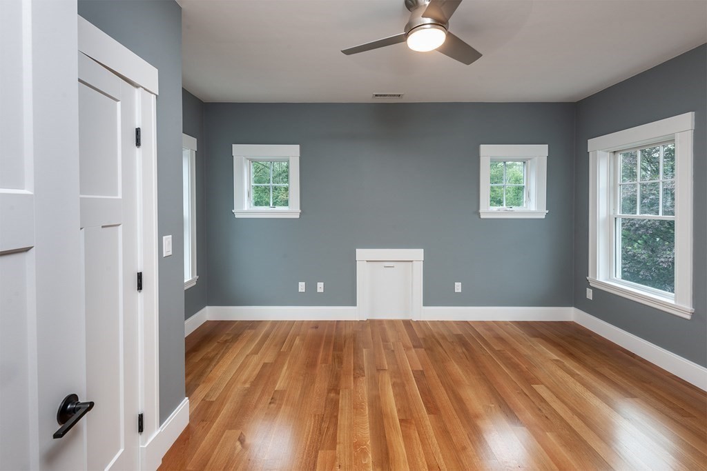 40 Rocky Hill Road Andover, MA 01810 - Photo 30 of 41 wooden floor in an empty room with a window