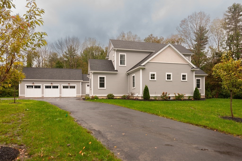 40 Rocky Hill Road Andover, MA 01810 - Photo 40 of 41 front view of a house with a yard