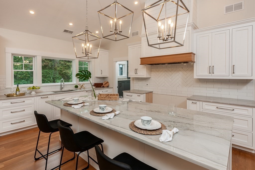 40 Rocky Hill Road Andover, MA 01810 - Photo 6 of 41 a kitchen with a table and chairs in it