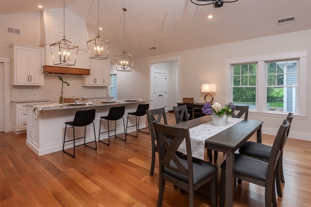 40 Rocky Hill Road Andover, MA 01810 - Photo 8 of 41 a view of a dining room with furniture window and wooden floor