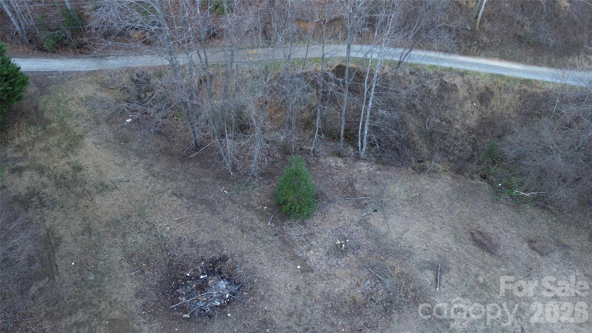 321 Mount Keys Drive Bryson City, NC 28713 - Photo 12 of 31 a view of a dry yard with wooden fence