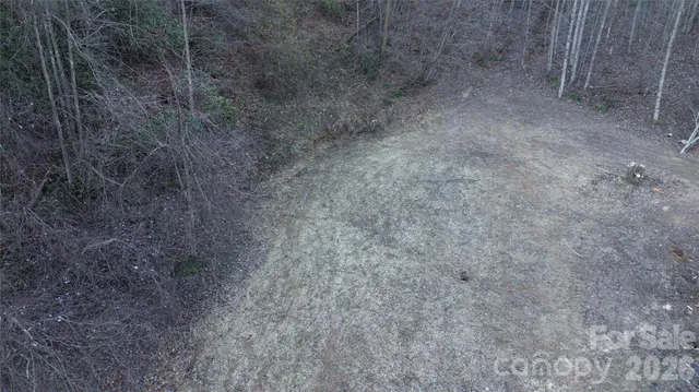 a view of a dry yard with a sink