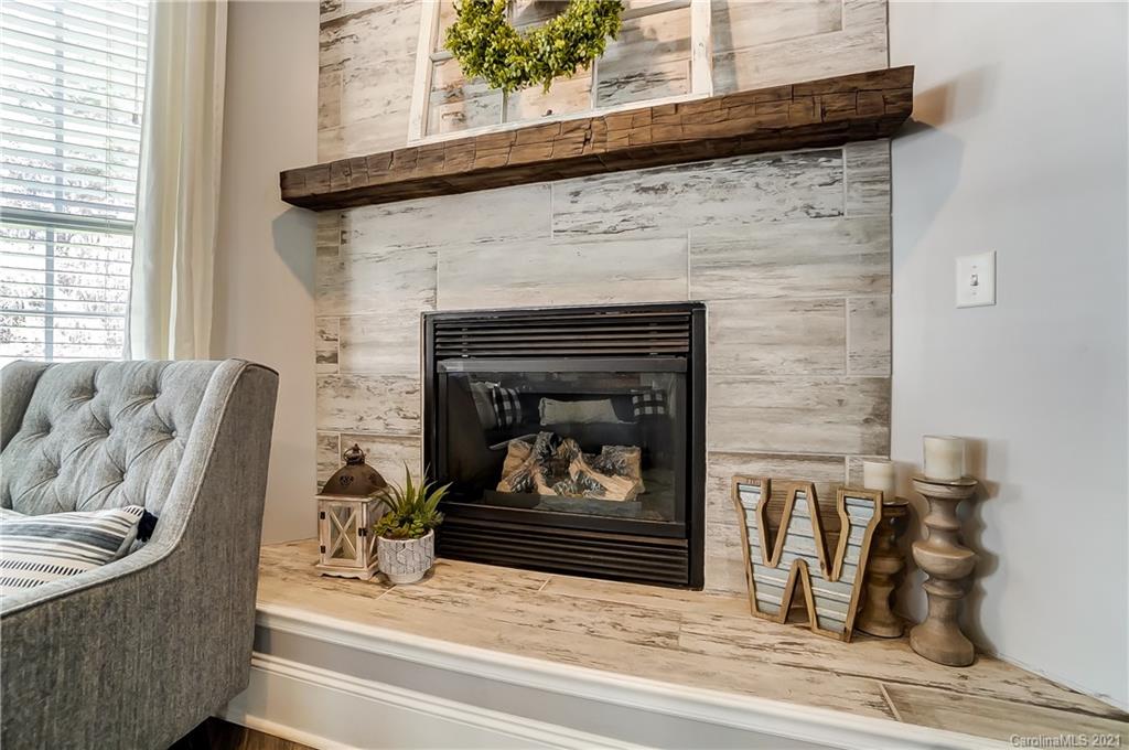 3284 Richard's Crossing Fort Mill, SC 29708 - Photo 11 of 43 a living room with furniture and a fireplace