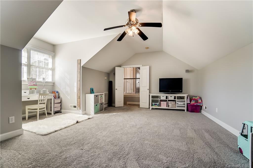 3284 Richard's Crossing Fort Mill, SC 29708 - Photo 22 of 43 a view of a livingroom with furniture and a flat screen tv