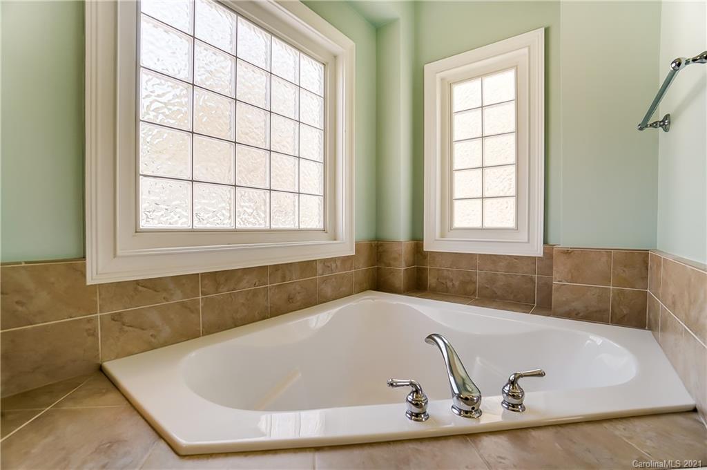 3284 Richard's Crossing Fort Mill, SC 29708 - Photo 29 of 43 a bath tub sitting in a bathroom next to a window