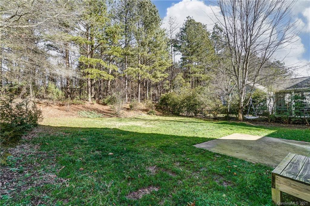 3284 Richard's Crossing Fort Mill, SC 29708 - Photo 38 of 43 a view of yard with swimming pool and trees
