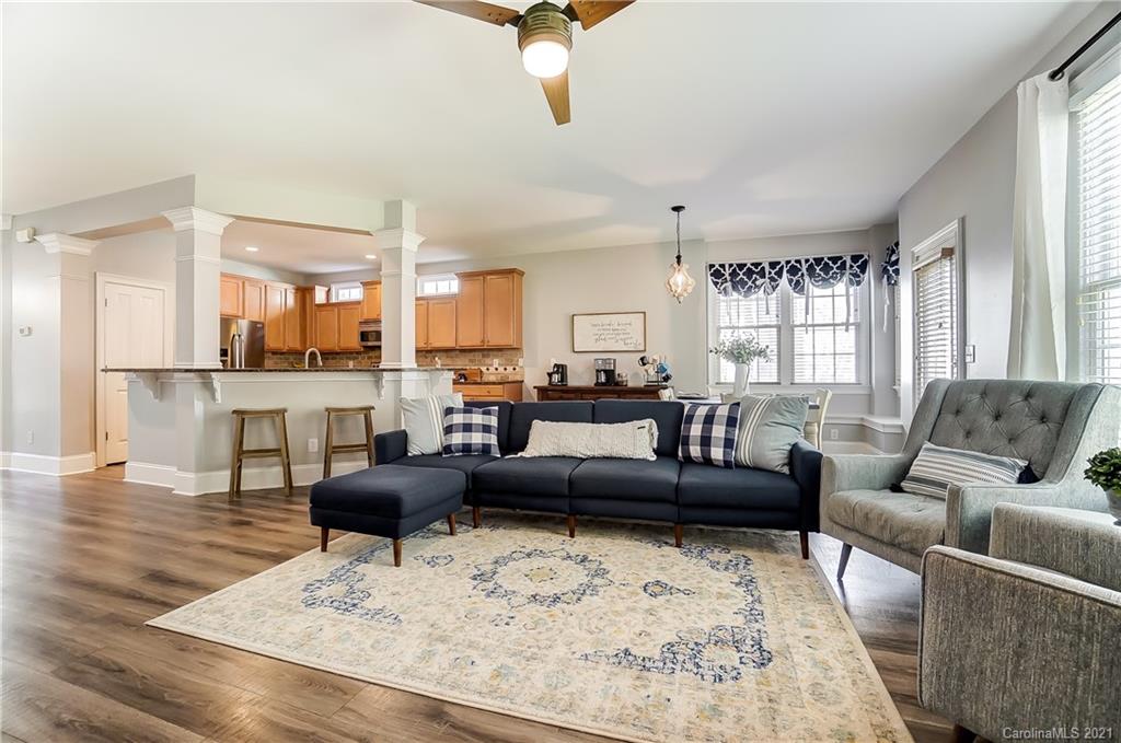 3284 Richard's Crossing Fort Mill, SC 29708 - Photo 10 of 43 a living room with furniture wooden floor and a large window