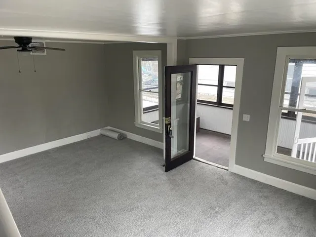 an empty room with windows