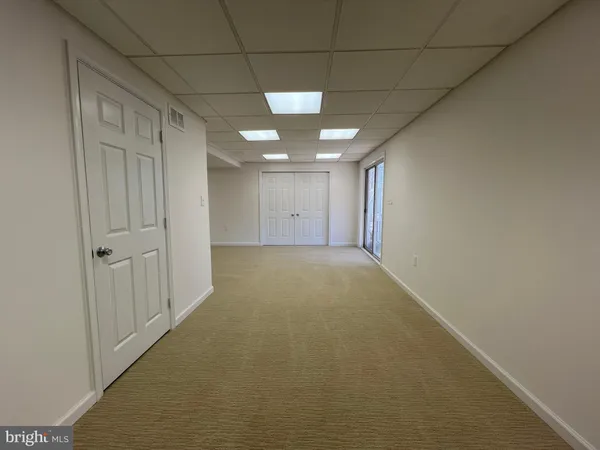 a view of a livingroom with a hallway