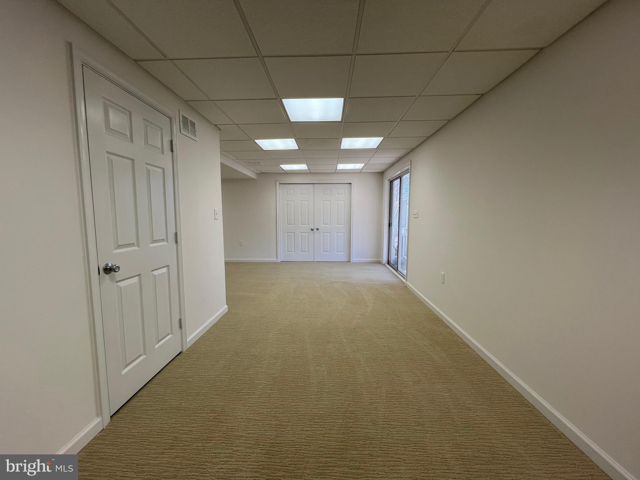 5629 Gunner Run Road Churchton, MD 20733 - Photo 40 of 51 a view of a livingroom with a hallway