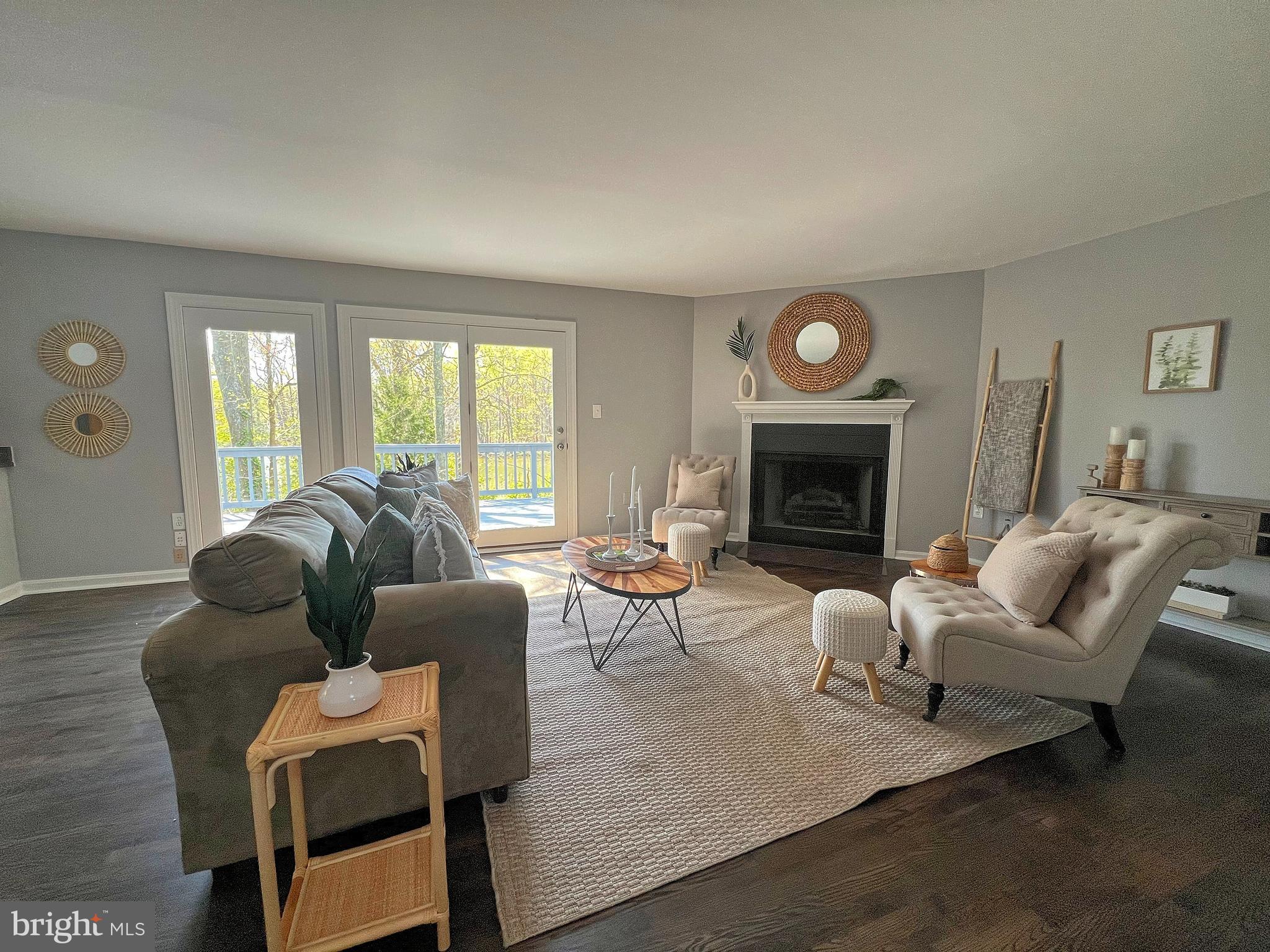 5629 Gunner Run Road Churchton, MD 20733 - Photo 8 of 51 a living room with furniture fireplace and a large window