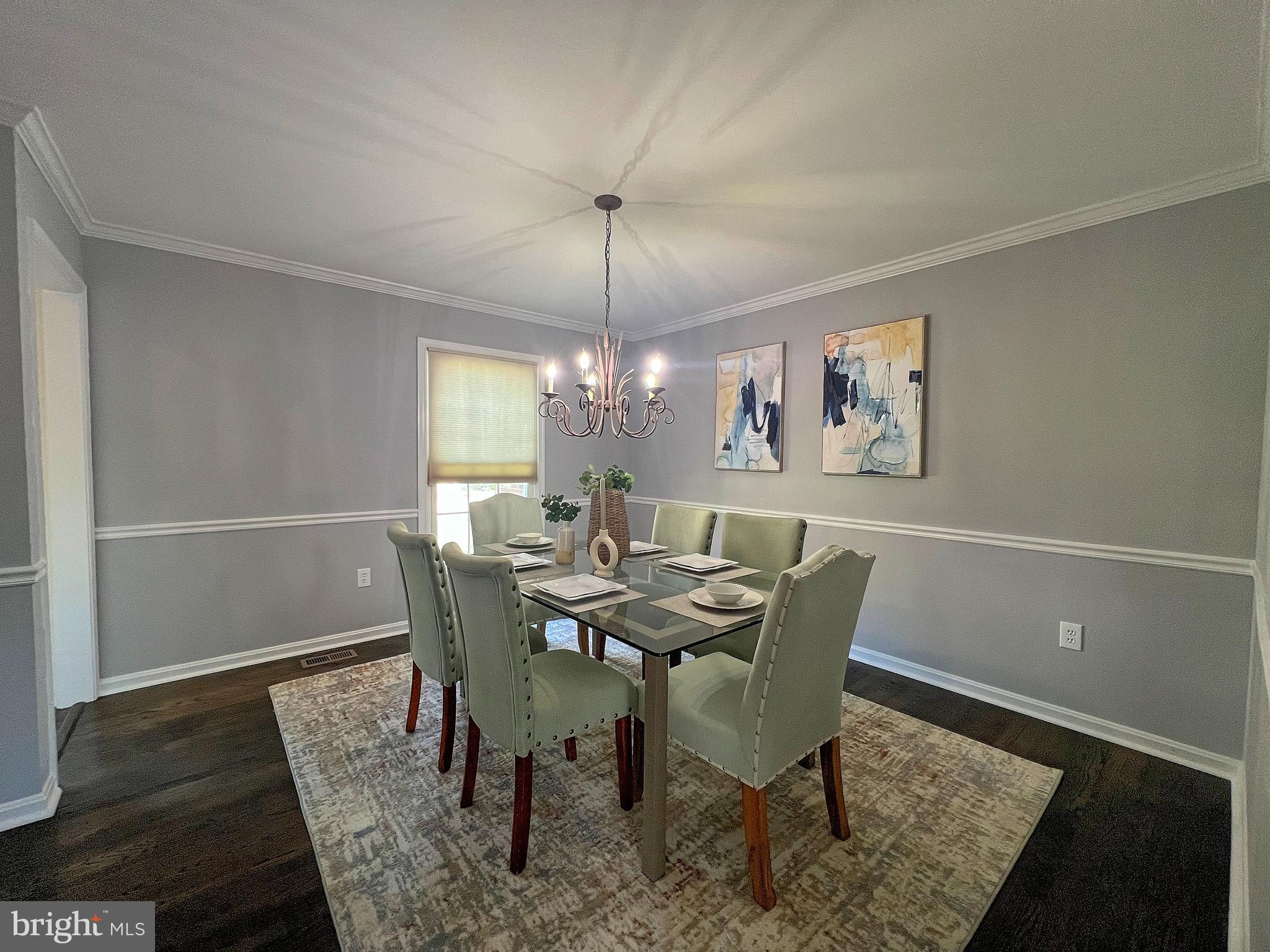 5629 Gunner Run Road Churchton, MD 20733 - Photo 10 of 51 a view of a dining room with furniture window and wooden floor