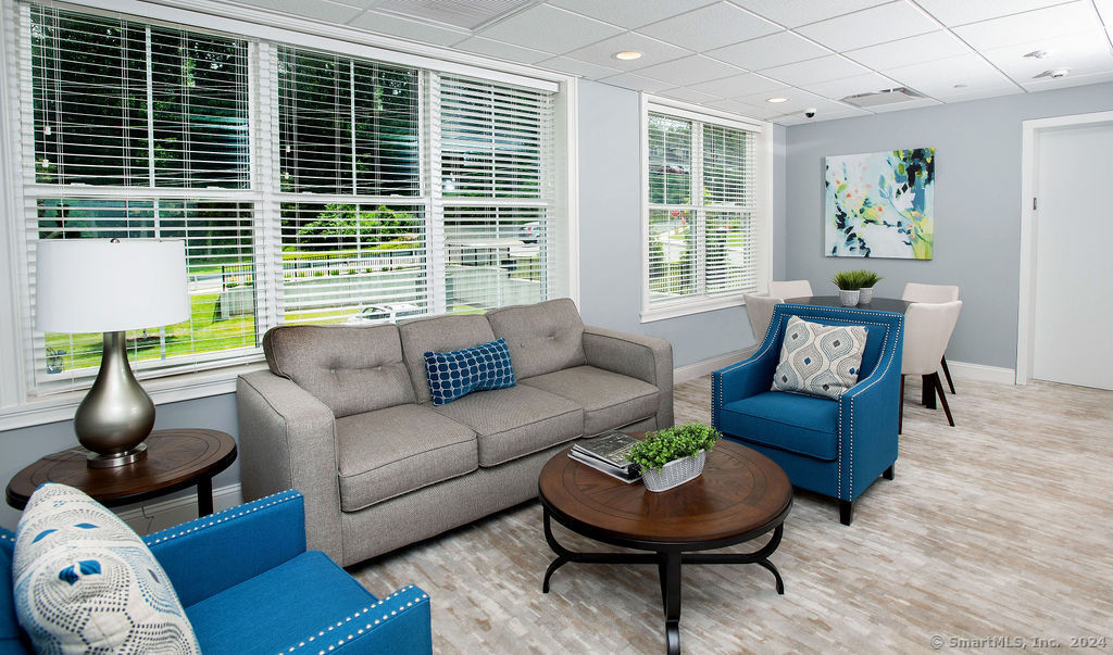 35 Old Quarry Road, Unit C8 Ridgefield, CT 06877 - Photo 13 of 15 a living room with furniture and a large window