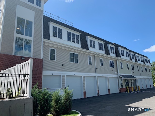 35 Old Quarry Road, Unit C8 Ridgefield, CT 06877 - Photo 15 of 15 a front view of a building with balcony