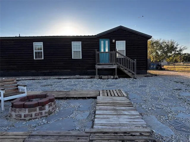 a view of house with entertaining space