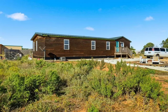 a front view of house with yard