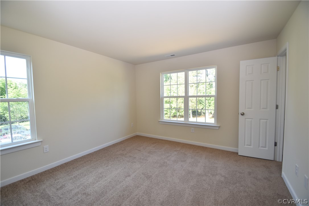 2435 Meadow Road Sandston, VA 23150 - Photo 13 of 14 an empty room with a window