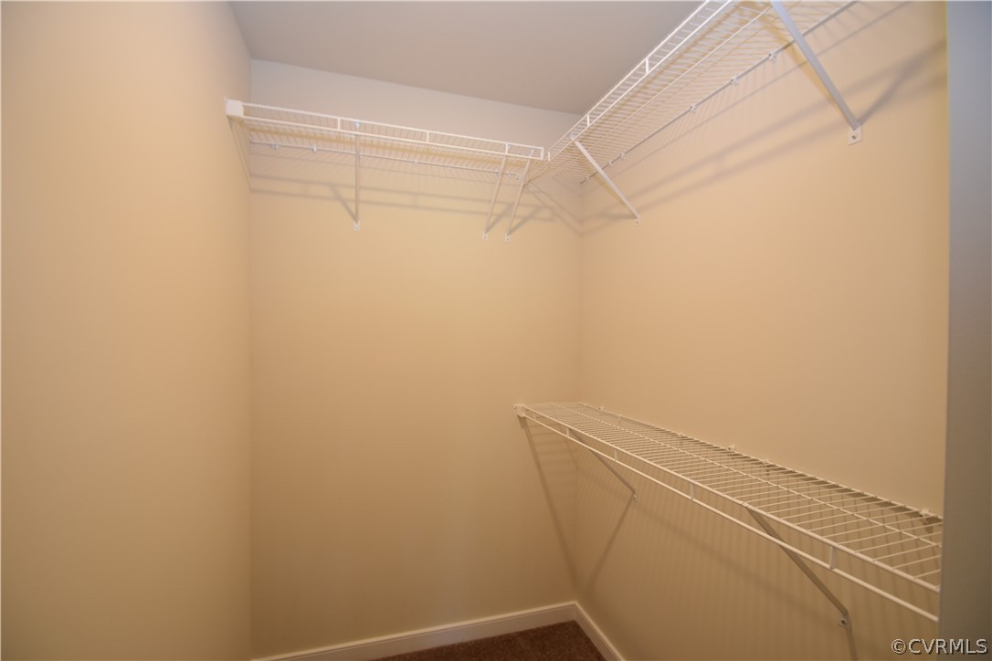 2435 Meadow Road Sandston, VA 23150 - Photo 10 of 14 a view of a room with racks on the wall