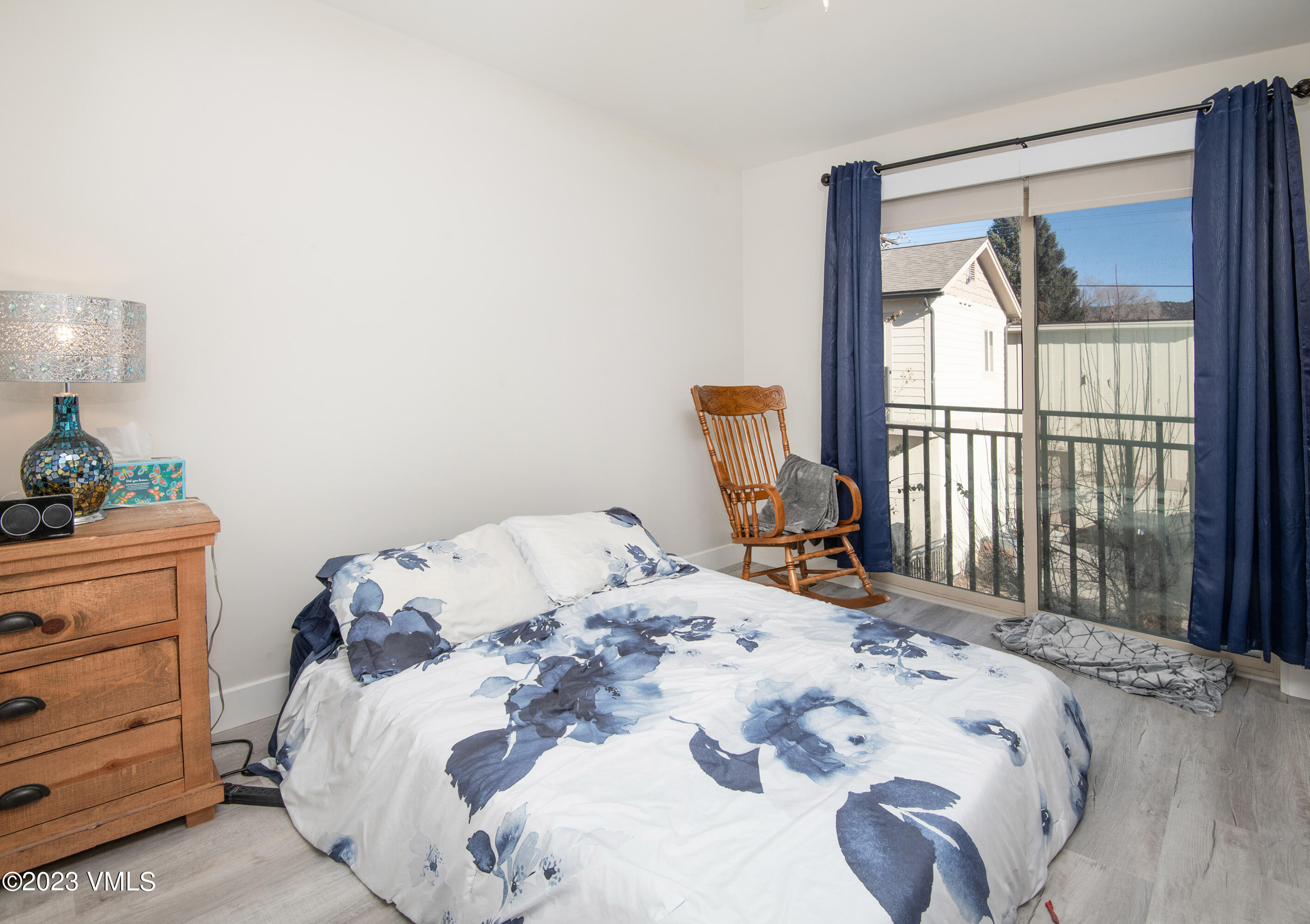 316 Wall Street, Unit 8 Eagle, CO 81631 - Photo 14 of 19 a bed sitting in a bedroom next to a window