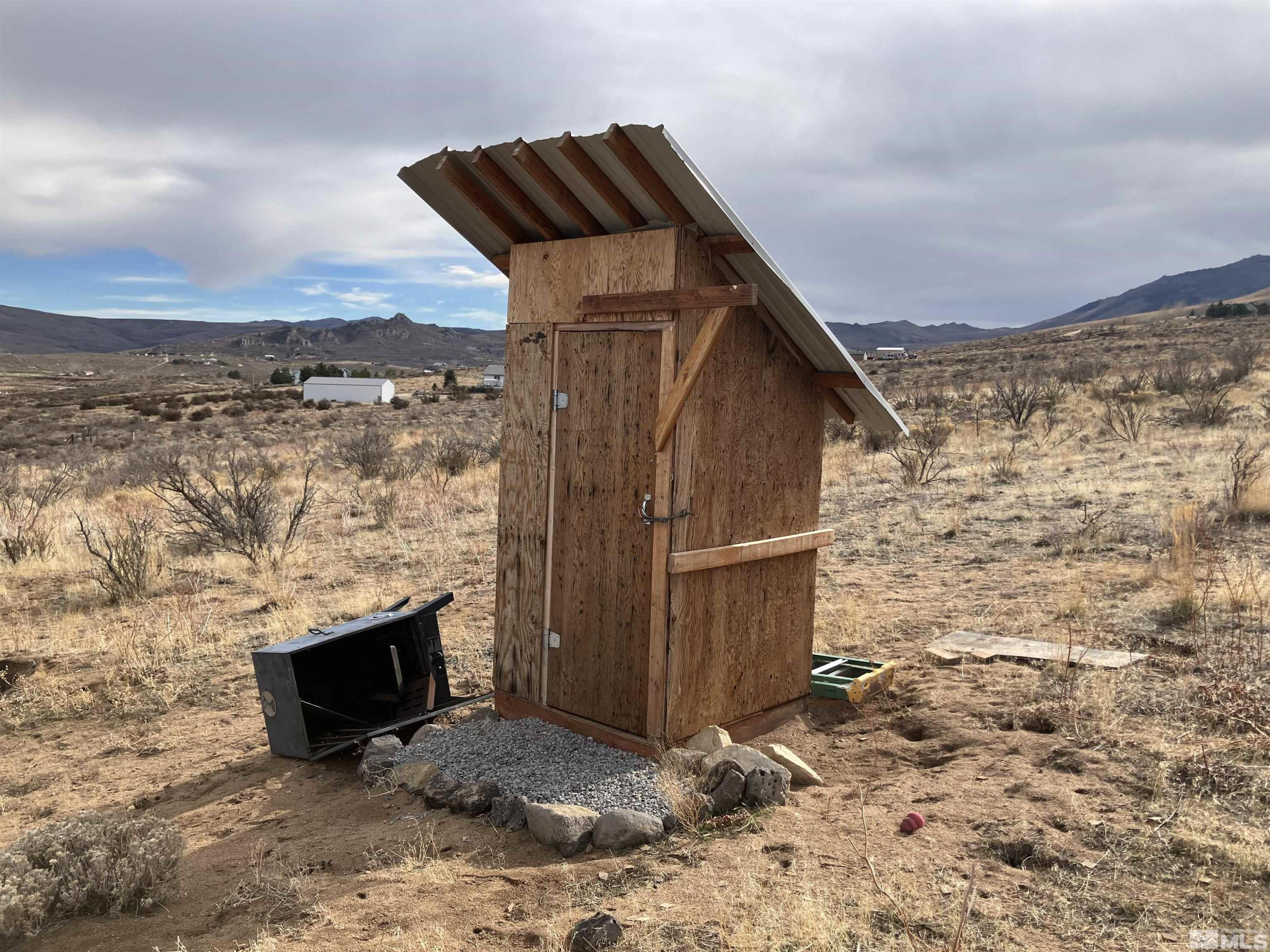 85 Appaloosa Circle Reno, NV 89508 - Photo 6 of 15 a view of outdoor space with oven and wooden fence