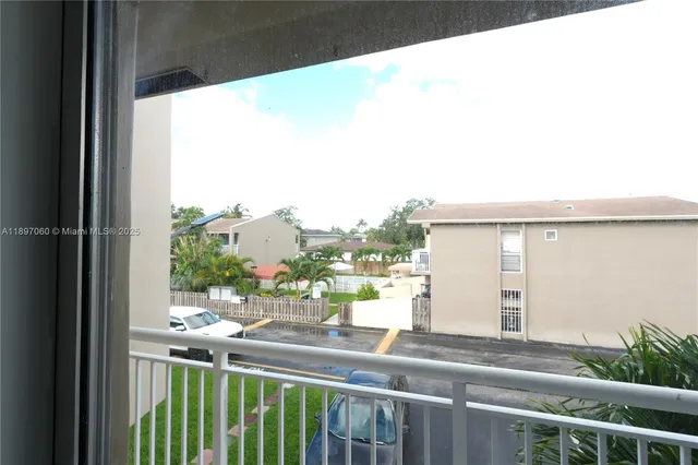 a view of a balcony with an outdoor space