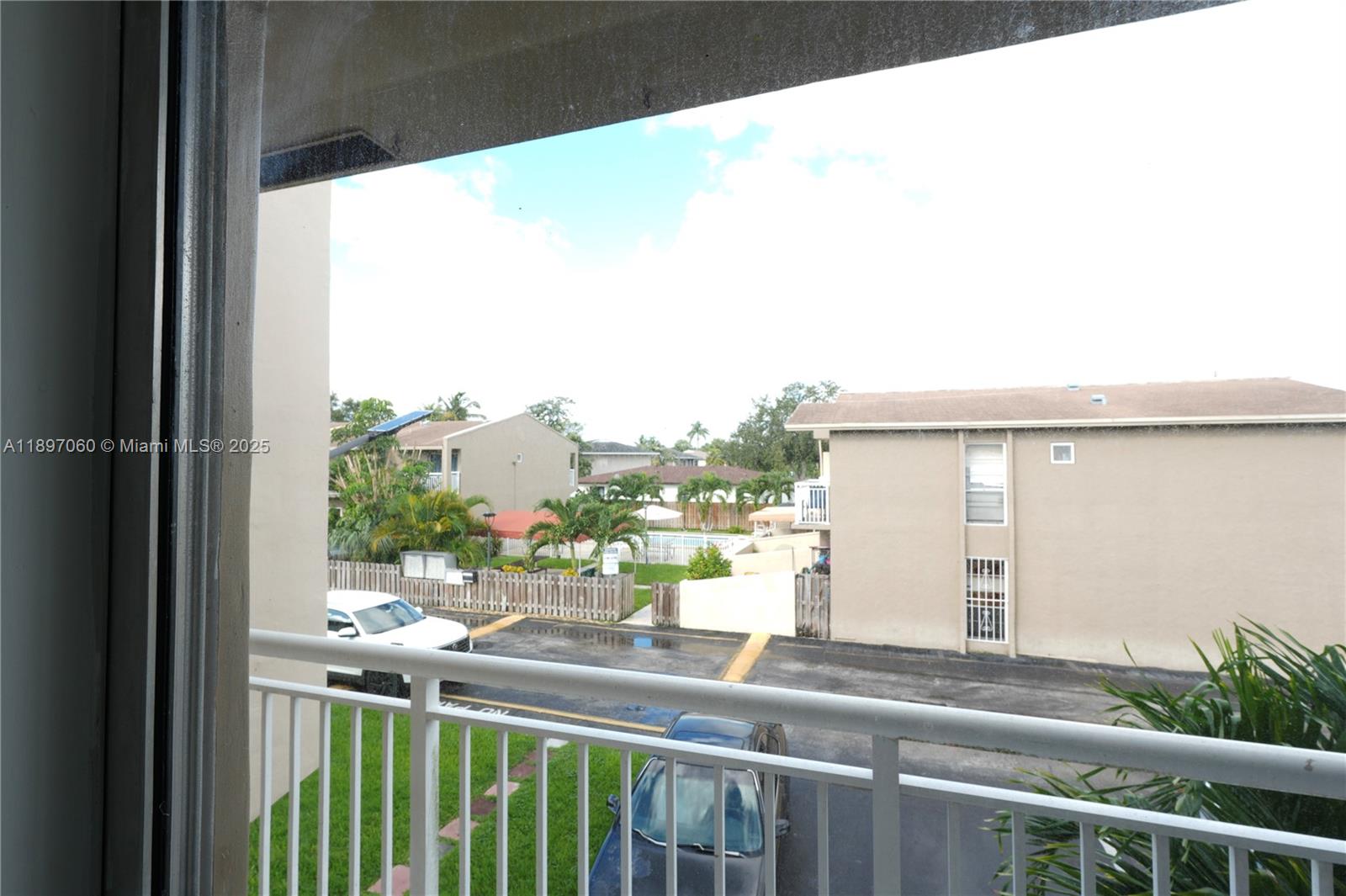 3791 Northwest 78th Avenue, Unit 24 Davie, FL 33024 - Photo 16 of 22 a view of a balcony with an outdoor space