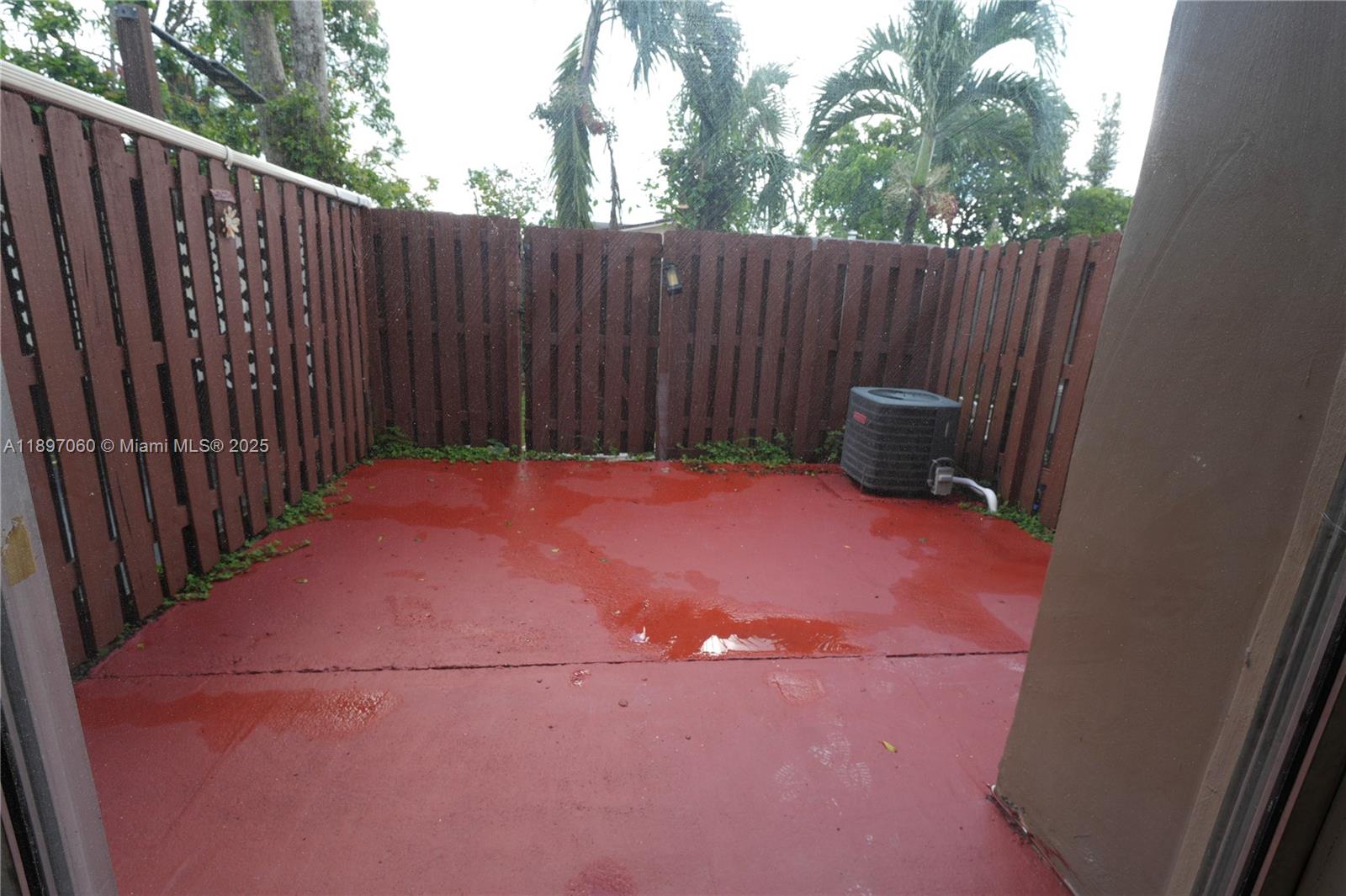 3791 Northwest 78th Avenue, Unit 24 Davie, FL 33024 - Photo 22 of 22 a backyard of a house