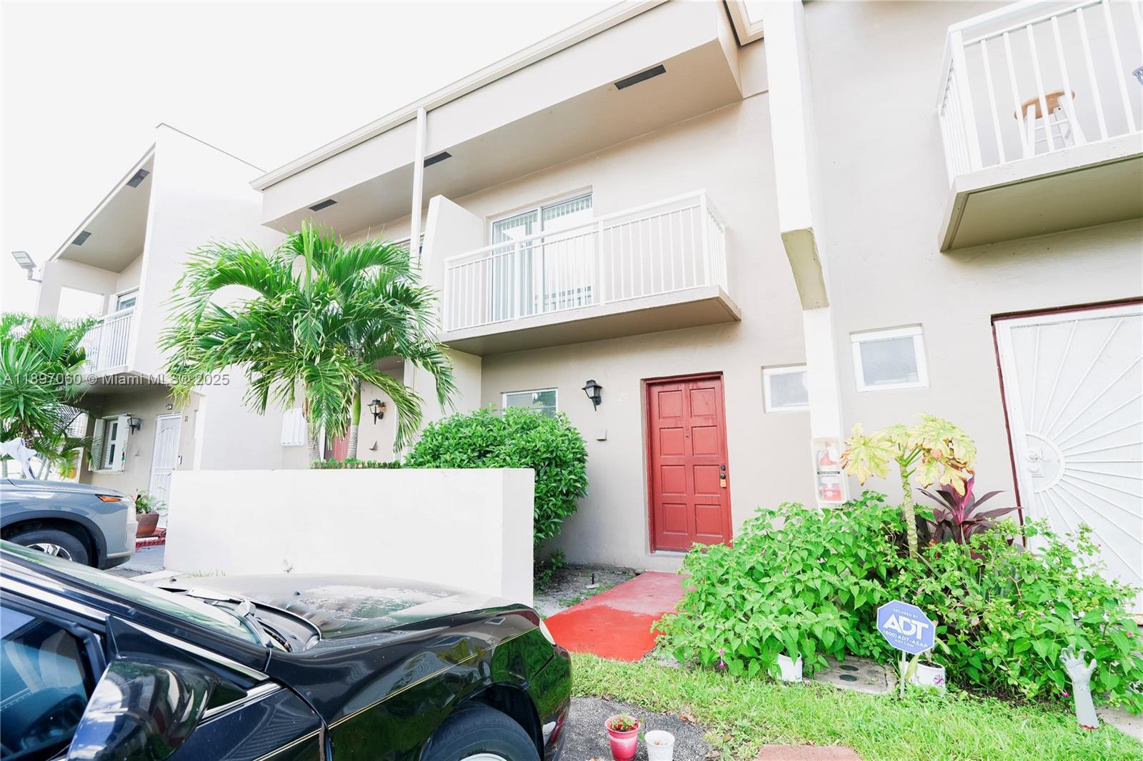3791 Northwest 78th Avenue, Unit 24 Davie, FL 33024 - Photo 3 of 22 a view of a backyard with plants and a patio