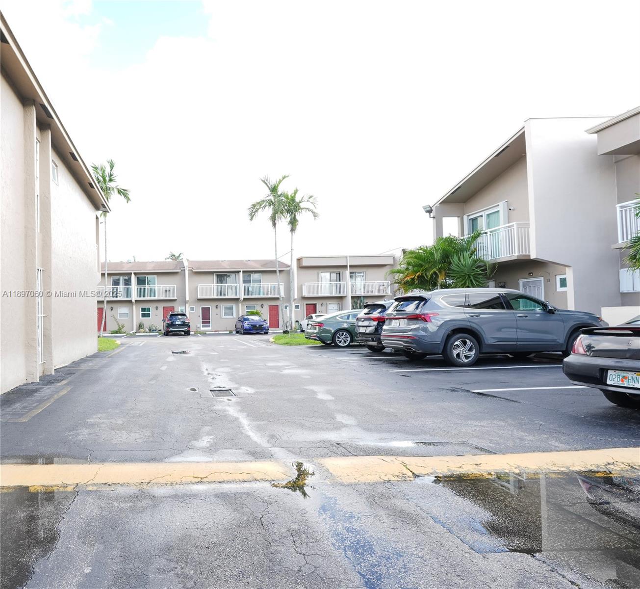 3791 Northwest 78th Avenue, Unit 24 Davie, FL 33024 - Photo 6 of 22 a view of street with parked cars