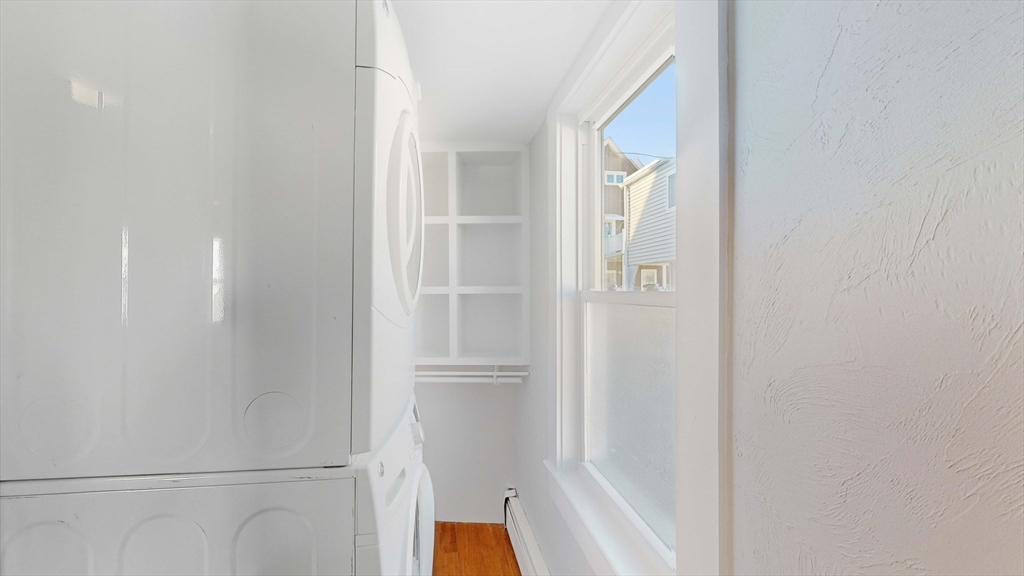40-42 Upham Street, Unit 1 Malden, MA 02148 - Photo 15 of 17 a bathroom with a bathtub