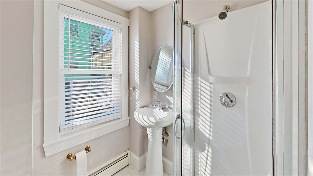 40-42 Upham Street, Unit 1 Malden, MA 02148 - Photo 16 of 17 a bathroom with a shower
