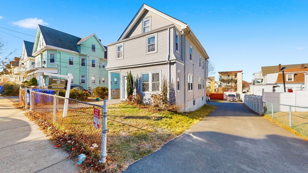 40-42 Upham Street, Unit 1 Malden, MA 02148 - Photo 3 of 17 a view of a house with sitting area
