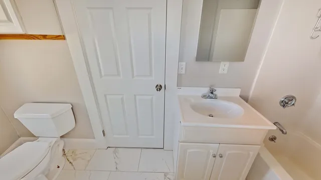 a bathroom with a sink and a toilet