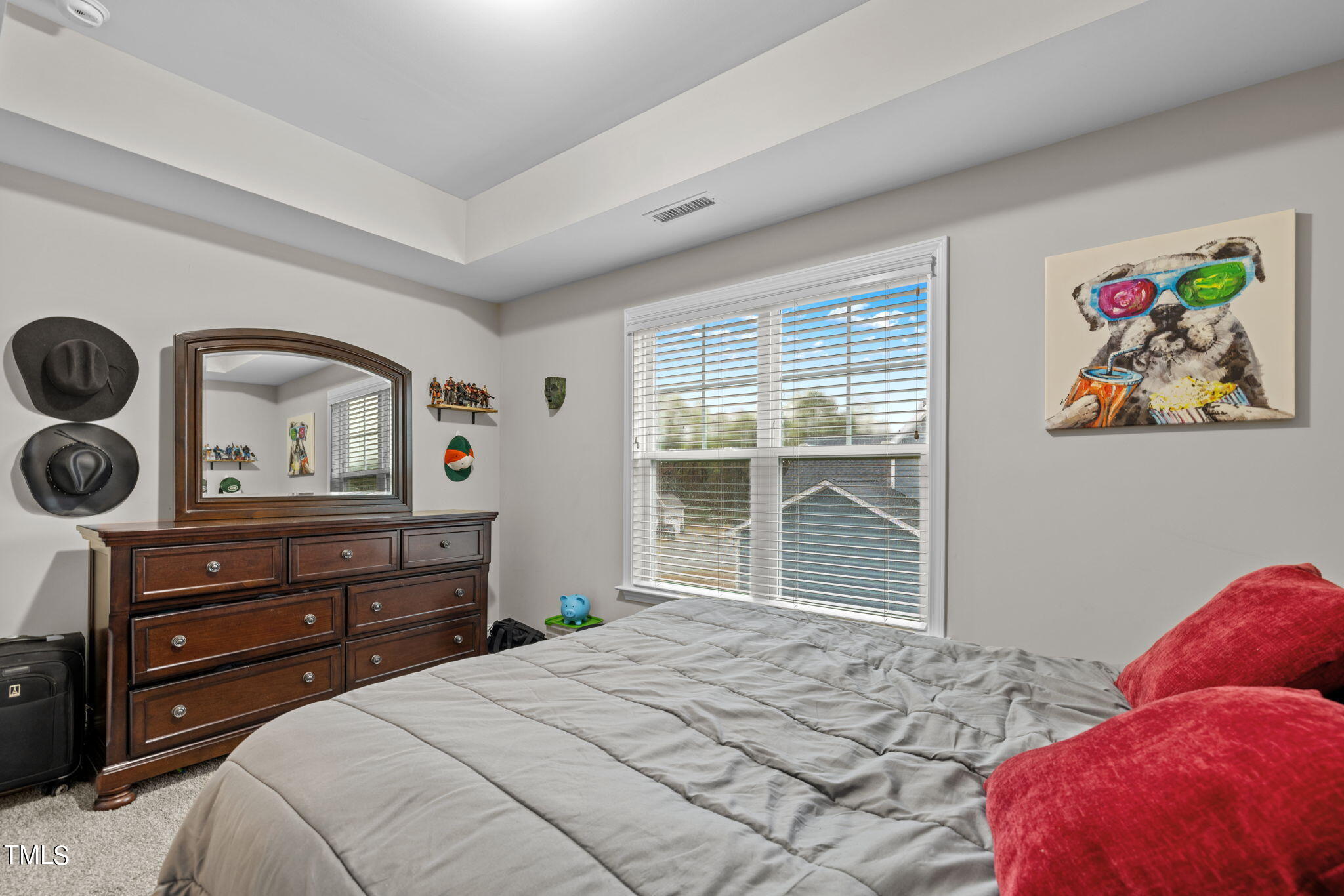 901 Peterson Ridge Road Fuquay-Varina, NC 27526 - Photo 17 of 23 a bedroom with a bed and cabinets