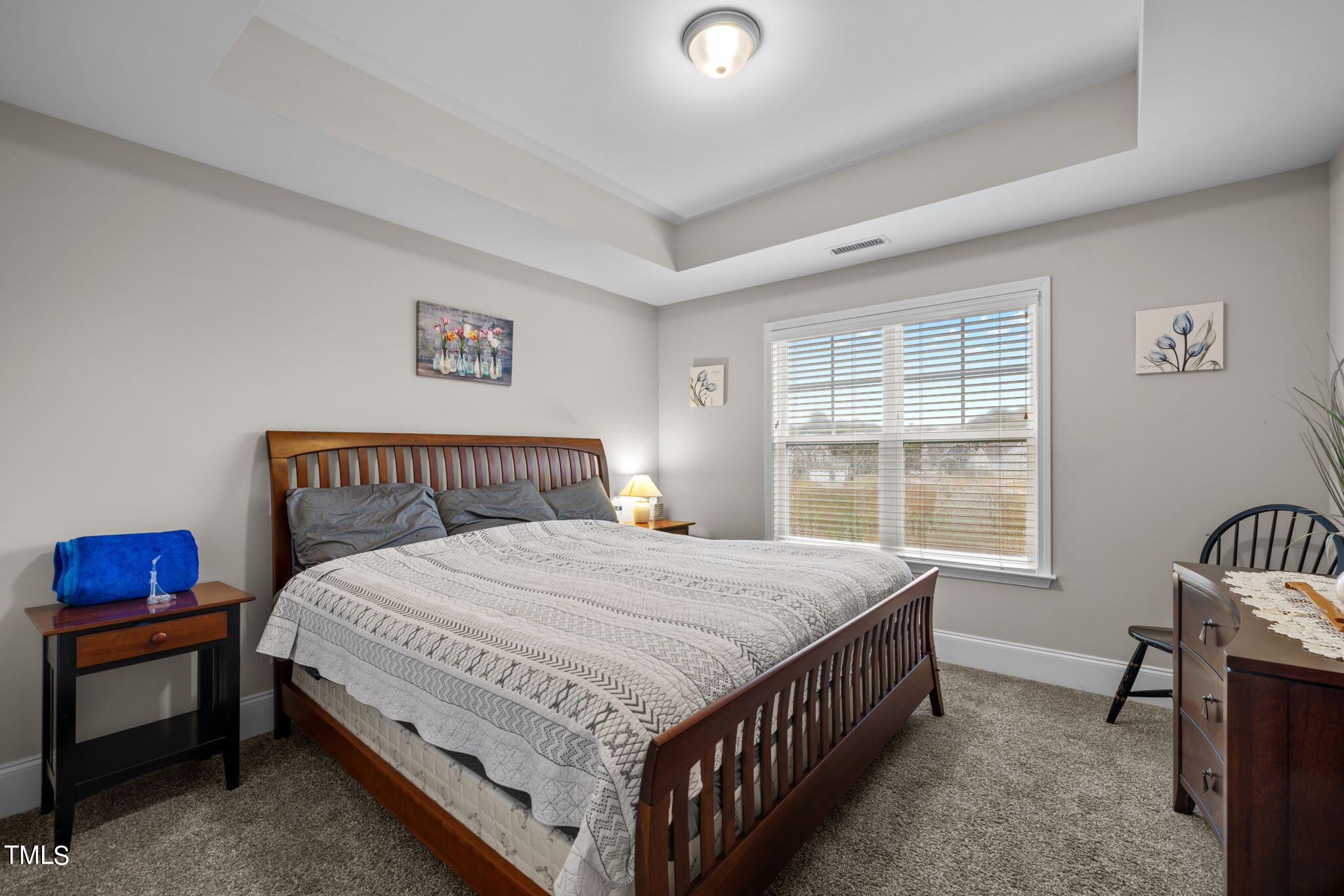 901 Peterson Ridge Road Fuquay-Varina, NC 27526 - Photo 18 of 23 a bedroom with a bed and a window
