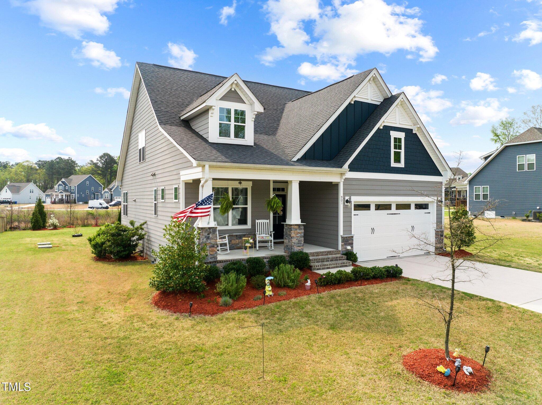 901 Peterson Ridge Road Fuquay-Varina, NC 27526 - Photo 2 of 23 a front view of house with swimming pool and patio