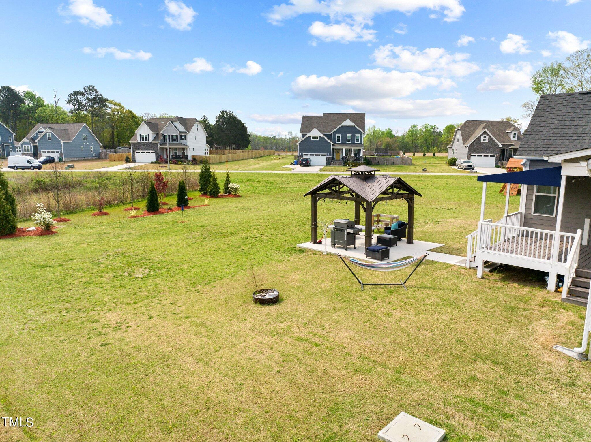901 Peterson Ridge Road Fuquay-Varina, NC 27526 - Photo 21 of 23 a view of a swimming pool with a patio