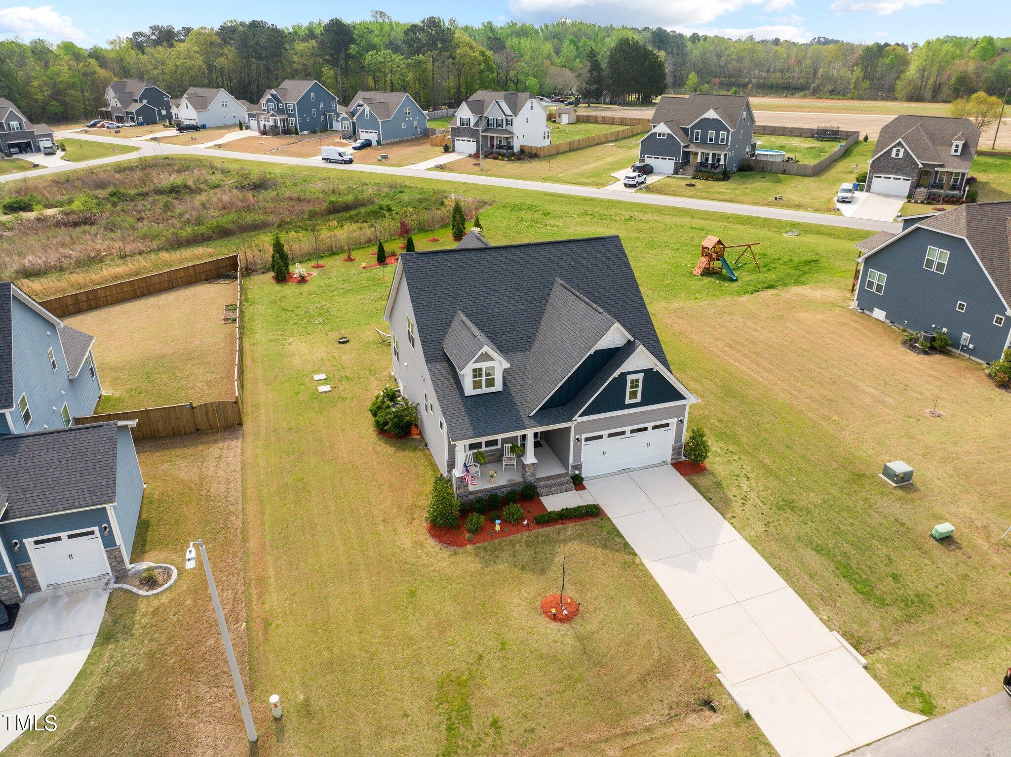 901 Peterson Ridge Road Fuquay-Varina, NC 27526 - Photo 23 of 23 a view of a swimming pool with a patio