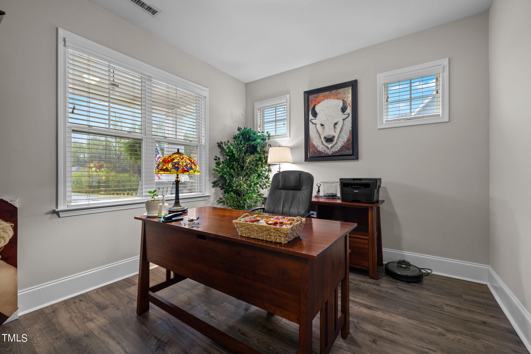 901 Peterson Ridge Road Fuquay-Varina, NC 27526 - Photo 5 of 23 a view of a workspace with furniture and a window