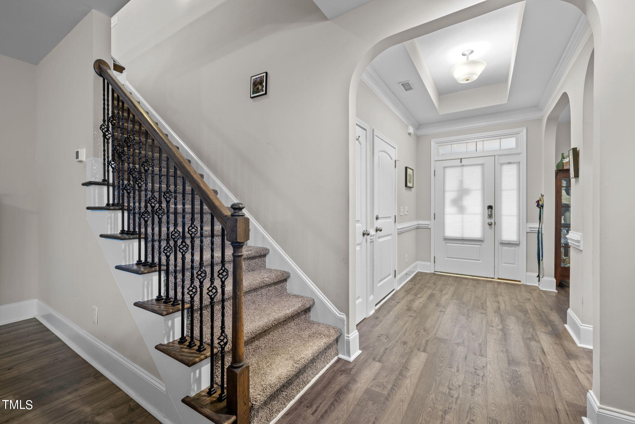 901 Peterson Ridge Road Fuquay-Varina, NC 27526 - Photo 6 of 23 a view of a hallway with wooden floor and entryway