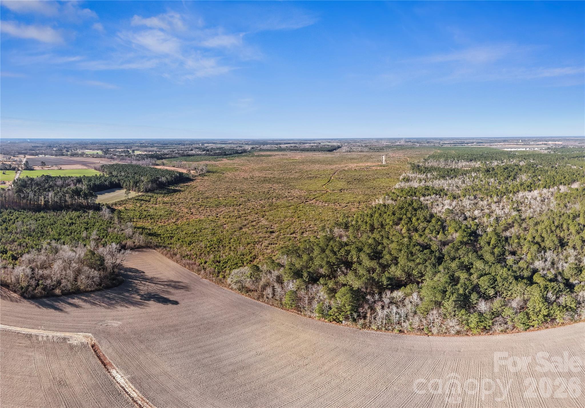 700-ac Earl Davis Road Rose Hill, NC 28458 - Photo 24 of 35 a view of a lake with a mountain