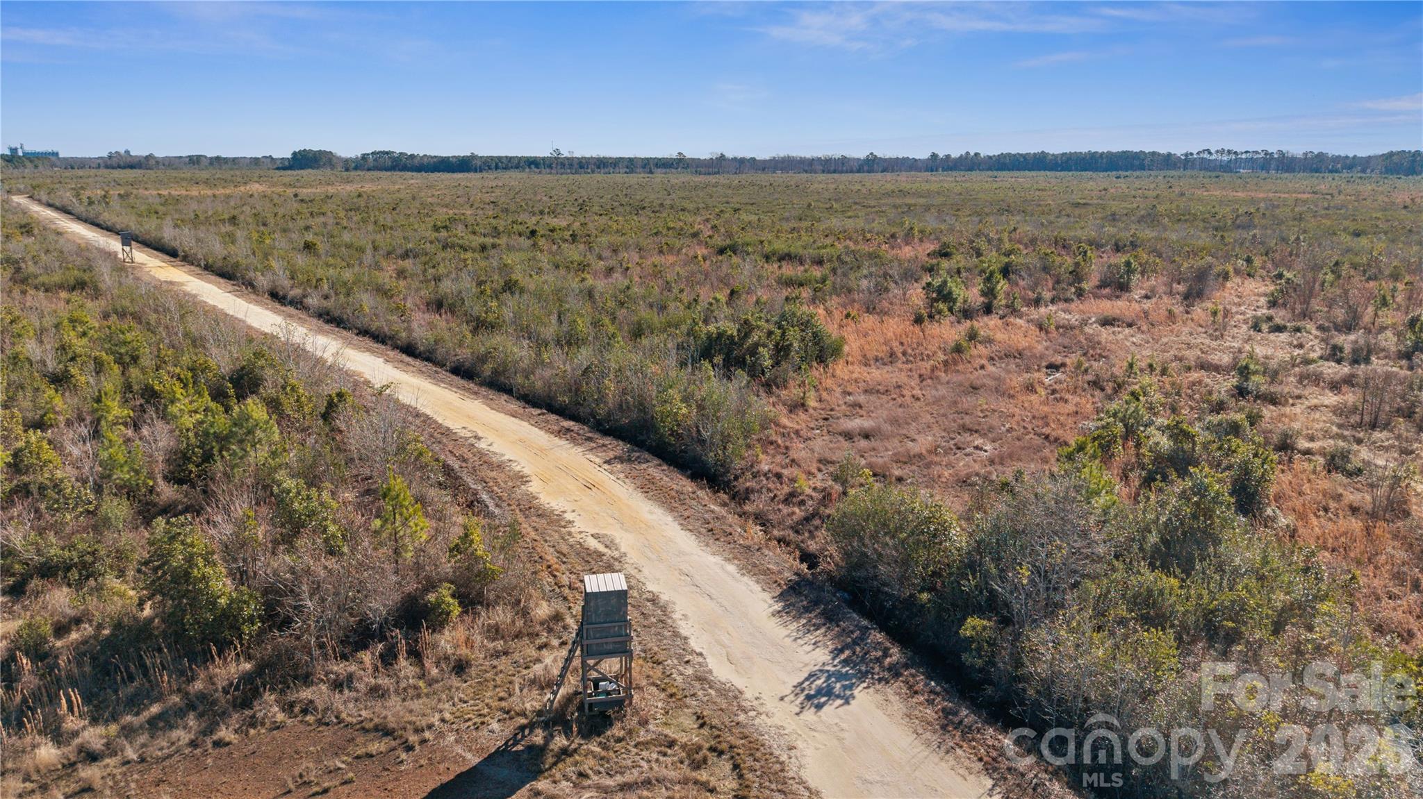 700-ac Earl Davis Road Rose Hill, NC 28458 - Photo 34 of 35 a view of an ocean beach and mountain