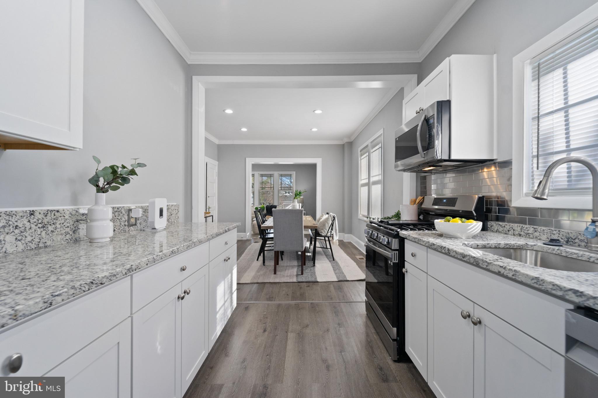 2808 Chelsea Terrace Baltimore, MD 21216 - Photo 5 of 29 Modern kitchen with sleek finishes.