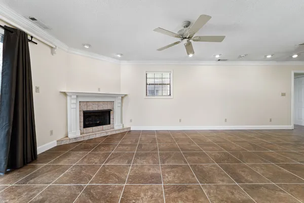 a spacious bathroom with bathtub and shower
