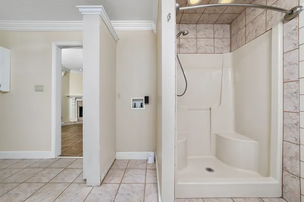 a view of a room with racks on the wall