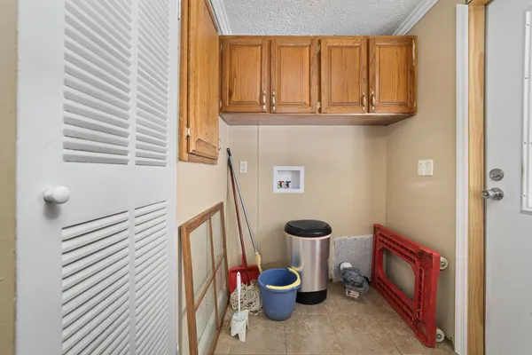 a view of wooden floor and windows in a room