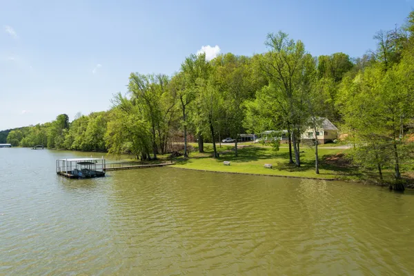 a view of a lake with a houses